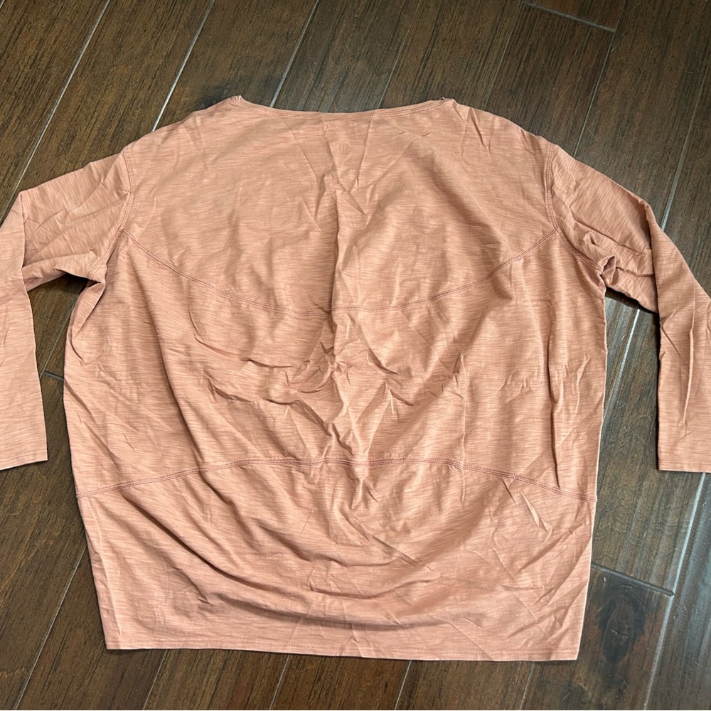 Lululemon Back In Action Long Sleeve Shirt
Size 10
Desert Sun - Picture 4 of 5